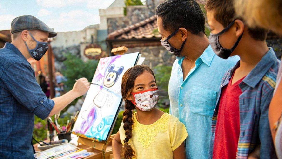 artista pintando en EPCOT en el Festival Internacional de las Artes